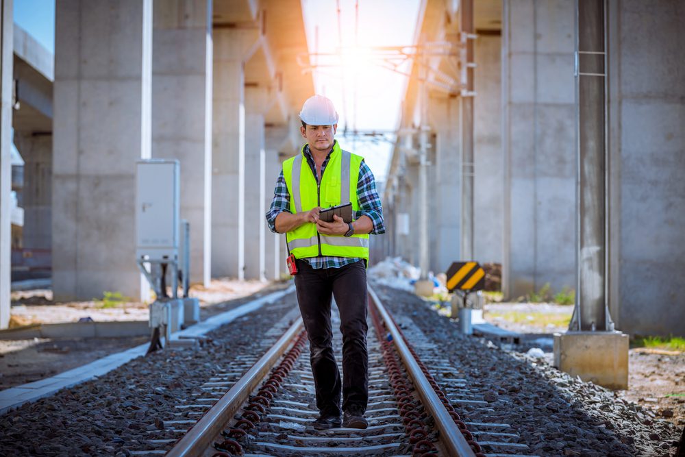 Railroad Flagger Requirements: When Contractors Need Flagging Near Train Tracks