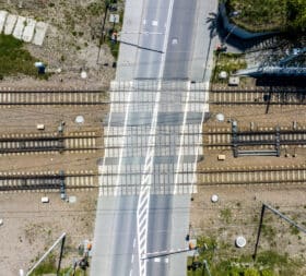 Rubber vs. Concrete vs. Timber vs. Composite Railroad Crossing Surfaces: Which One Holds Up Best?